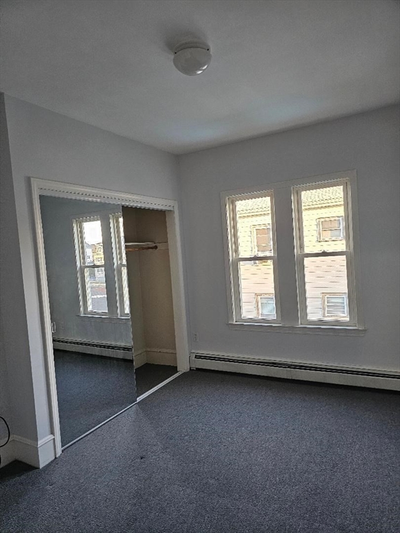 403 Manchester Street, Unit 3 Fall River, MA 02721 - Photo 5 of 15 an empty room with a window