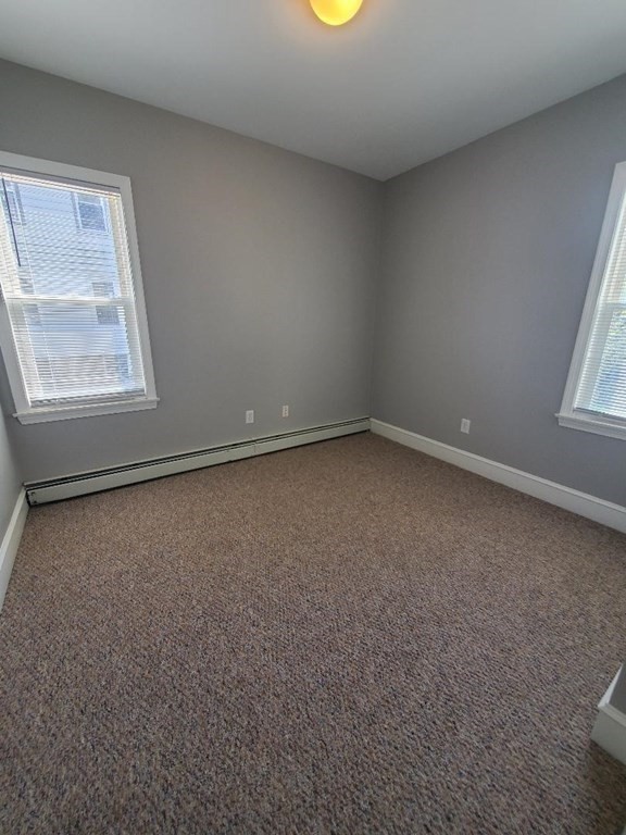 403 Manchester Street, Unit 3 Fall River, MA 02721 - Photo 10 of 15 an empty room with a window