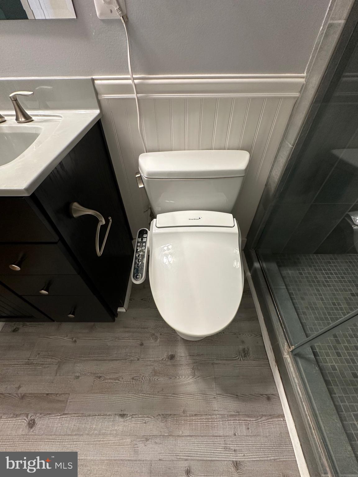 11152 Forest Edge Drive Reston, VA 20190 - Photo 31 of 102 a bathroom with a toilet and a sink