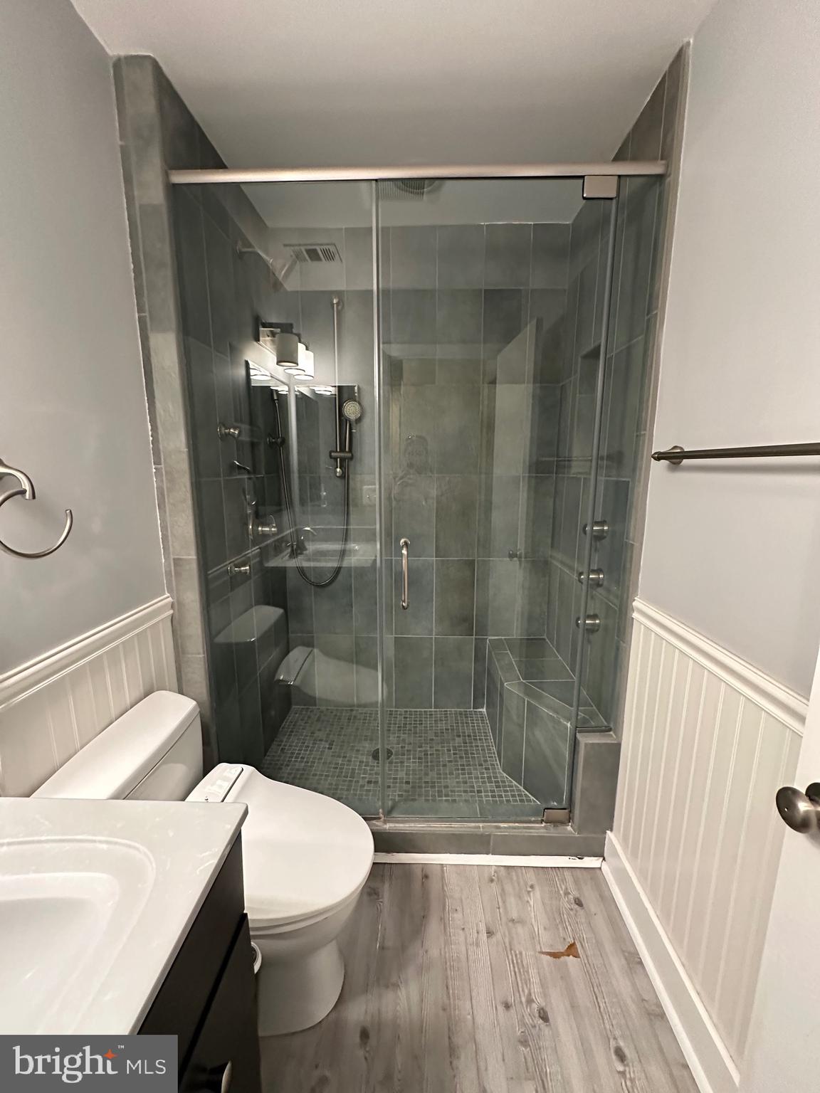 11152 Forest Edge Drive Reston, VA 20190 - Photo 34 of 102 a bathroom with a sink and a shower