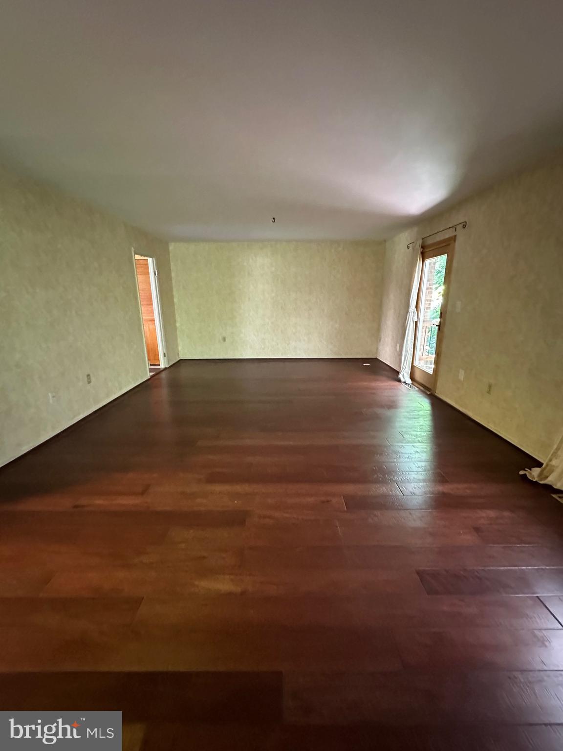 11152 Forest Edge Drive Reston, VA 20190 - Photo 67 of 102 an empty room with wooden floor