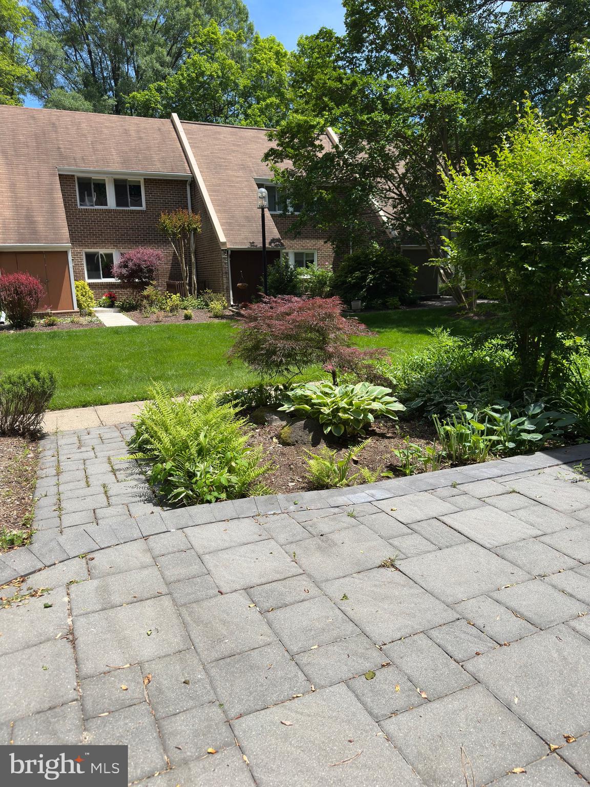 11152 Forest Edge Drive Reston, VA 20190 - Photo 8 of 102 a view of a front of house with a yard