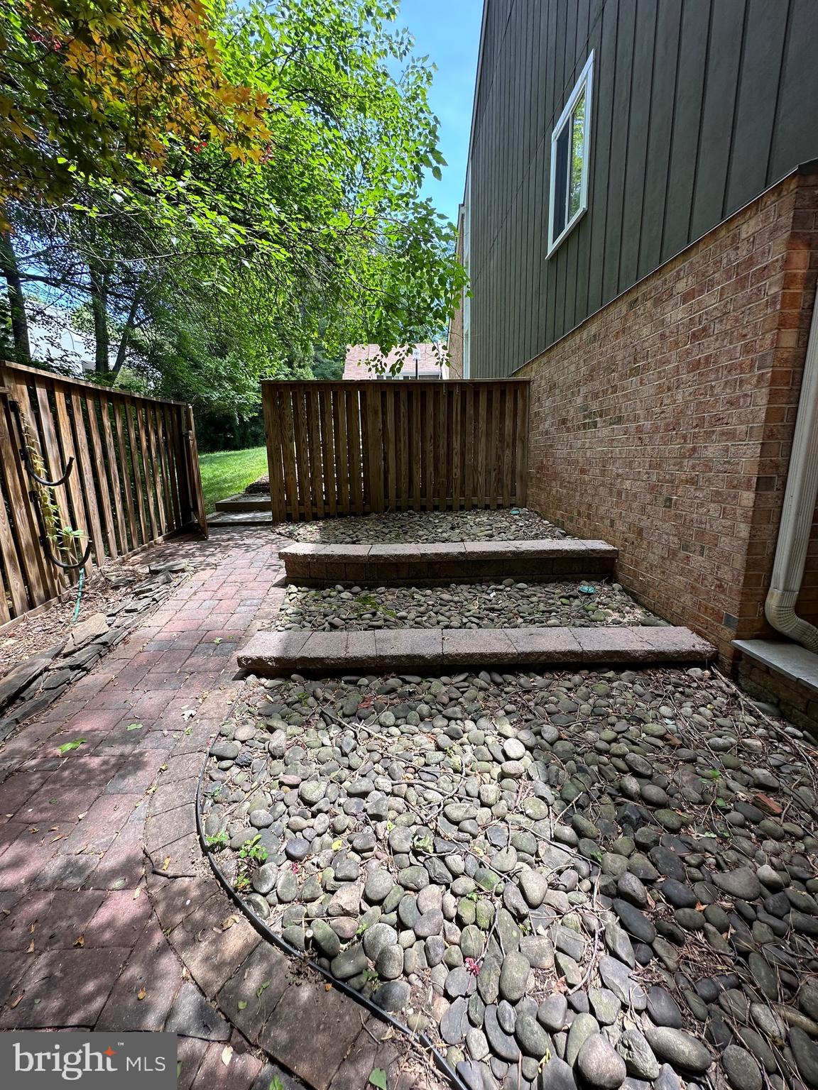11152 Forest Edge Drive Reston, VA 20190 - Photo 85 of 102 a view of a backyard with wooden fence