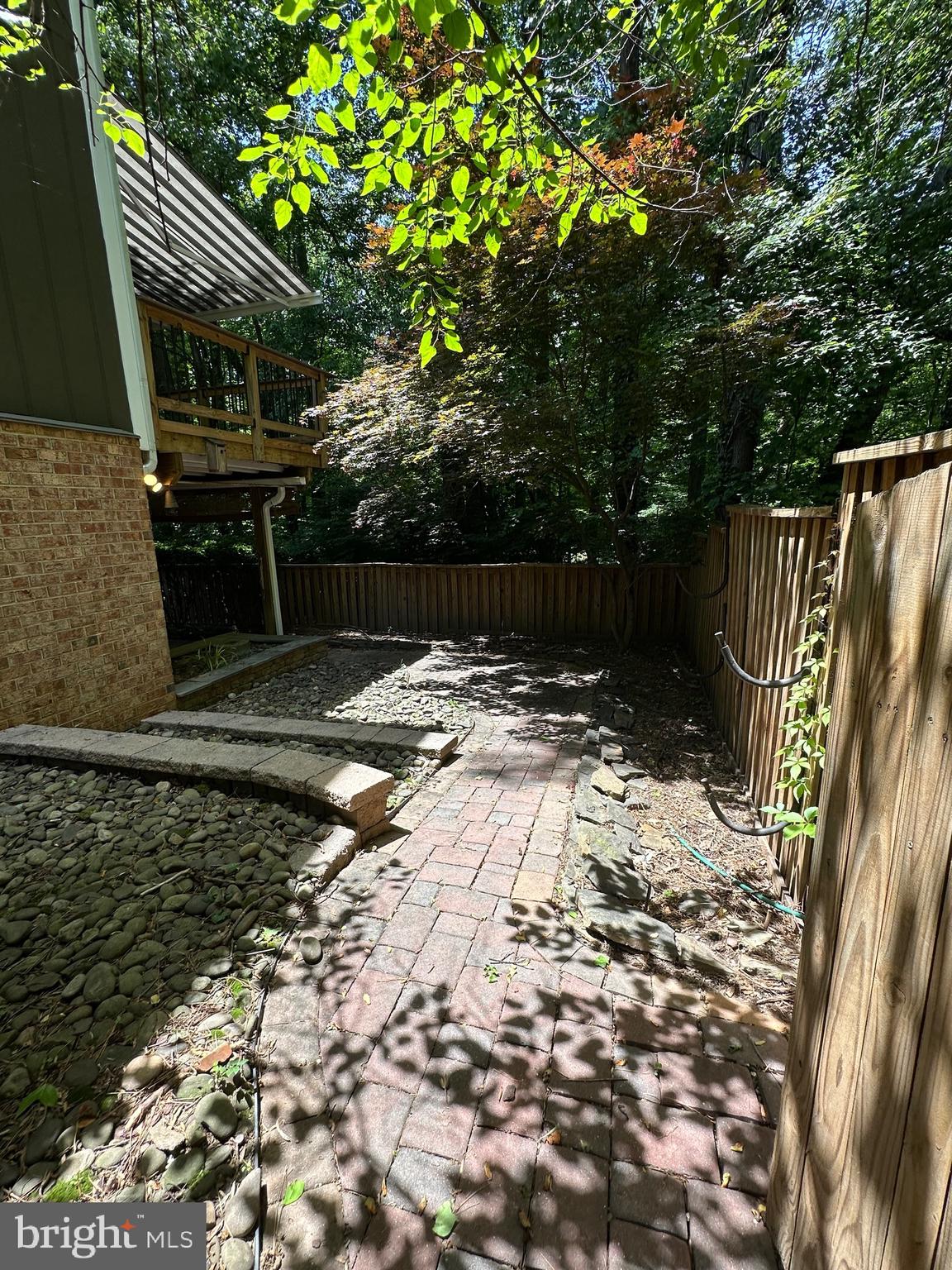 11152 Forest Edge Drive Reston, VA 20190 - Photo 94 of 102 a backyard of a house with lots of green space