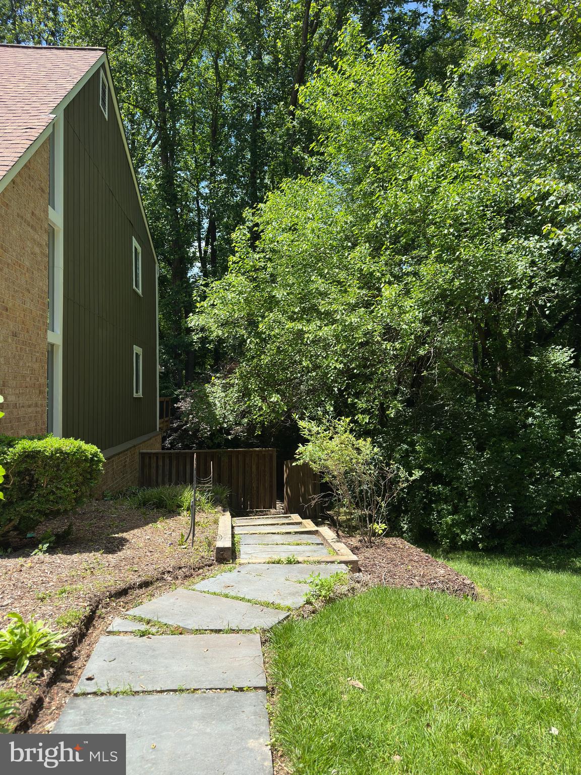 11152 Forest Edge Drive Reston, VA 20190 - Photo 97 of 102 a swimming pool with potted plants and large trees