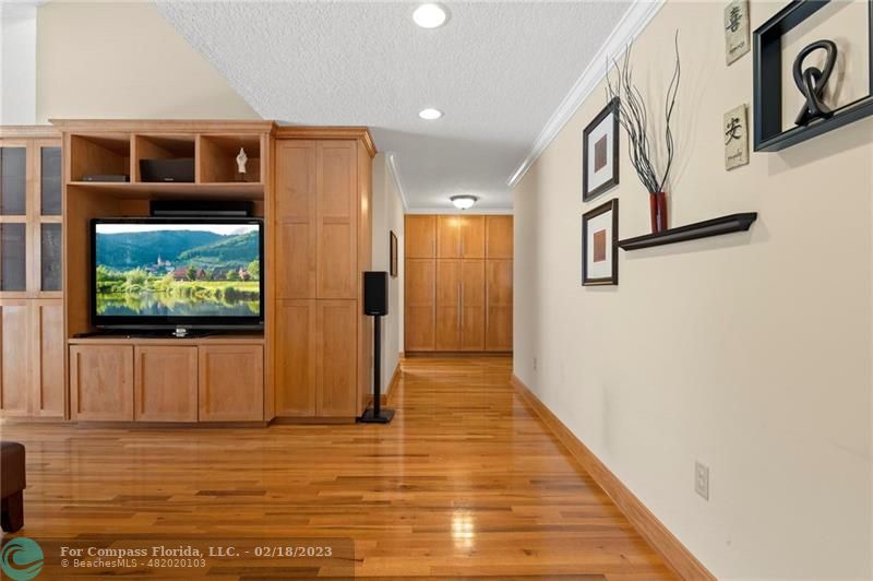 121 Landward Drive Jupiter, FL 33477 - Photo 16 of 43 a view of gallery with wooden floor