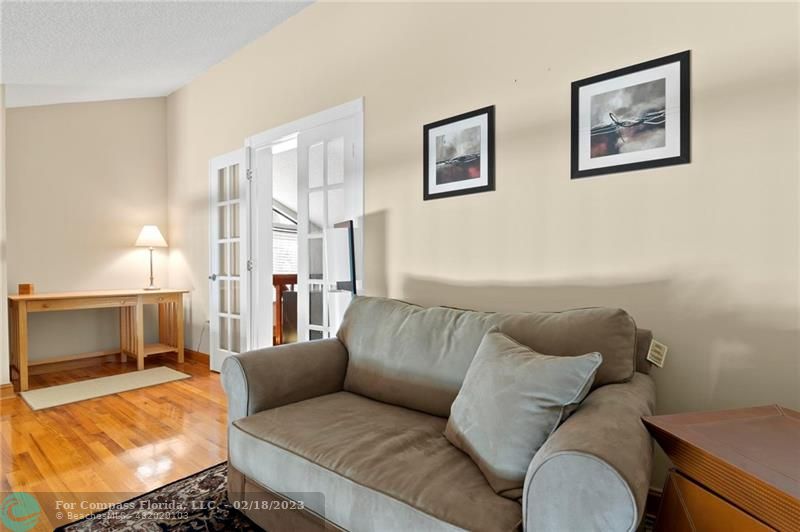 121 Landward Drive Jupiter, FL 33477 - Photo 39 of 43 a living room with furniture and a fireplace