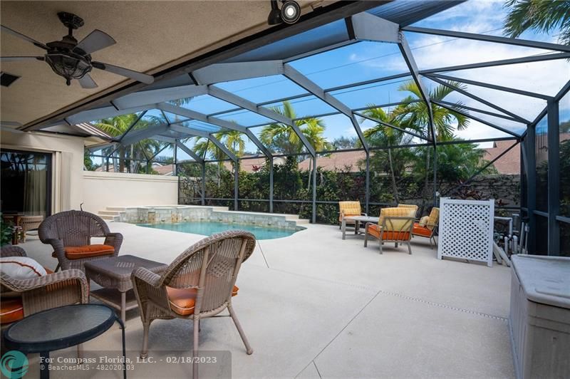 121 Landward Drive Jupiter, FL 33477 - Photo 6 of 43 a view of backyard with outdoor seating a patio and a garden