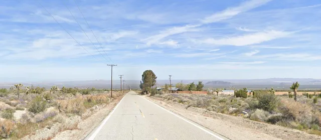 a view of a lake with a mountain