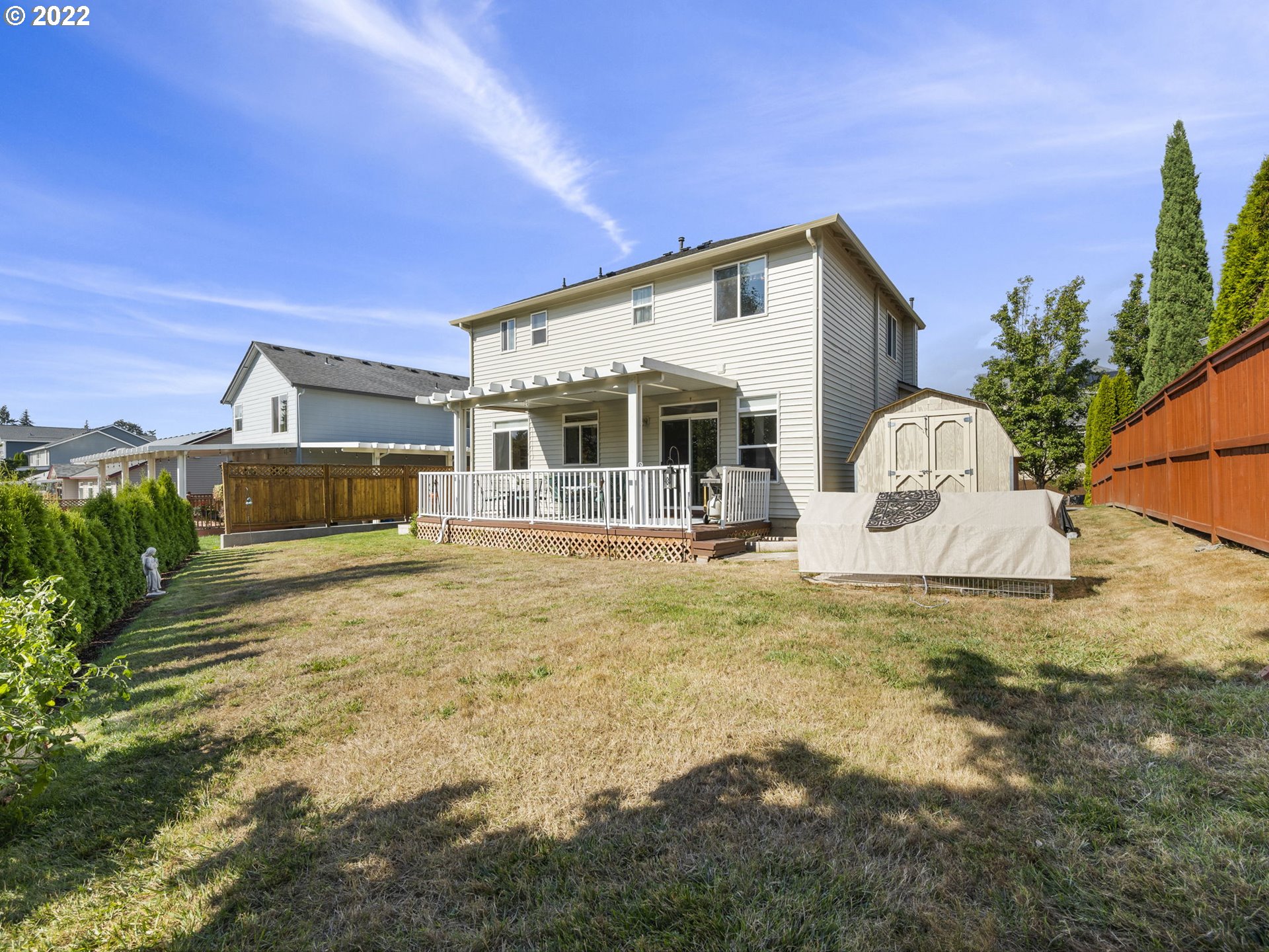 1811 North Falcon Drive Ridgefield, WA 98642 - Photo 28 of 32 a view of a house with backyard and sitting area