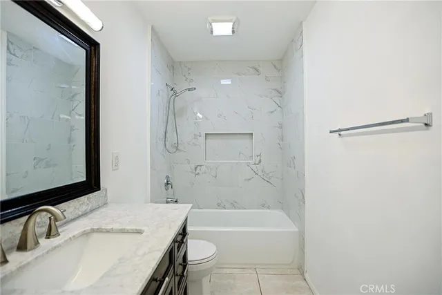 a view of room with wooden floor and window