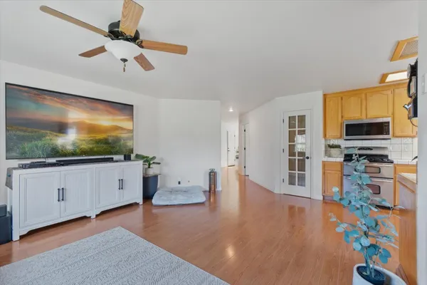 a living room with furniture and a flat screen tv