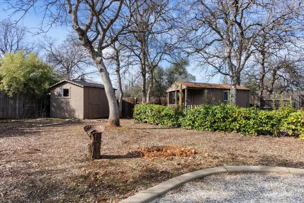 a view of a swimming pool with sitting area