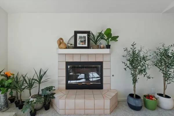 a view of a livingroom with furniture and chandelier