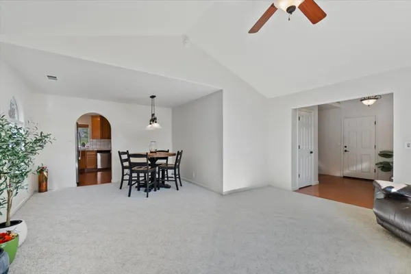 a view of a dining room with furniture