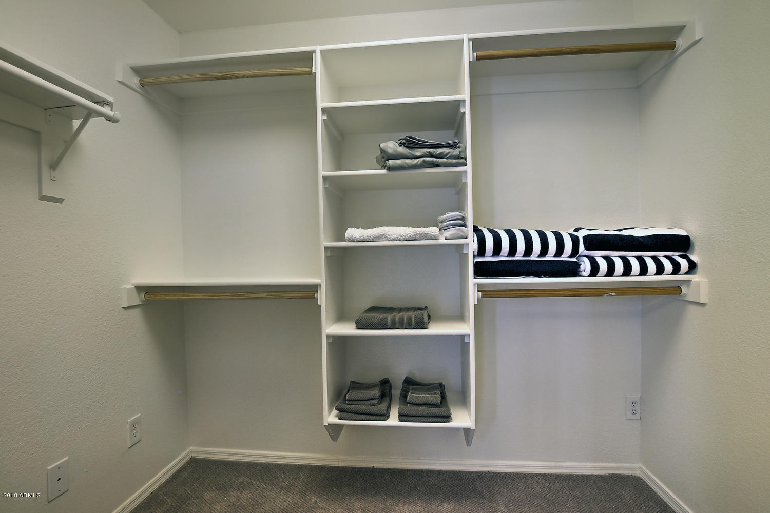 6521 East Grandview Drive Scottsdale, AZ 85254 - Photo 20 of 27 a shelf with cup and plates