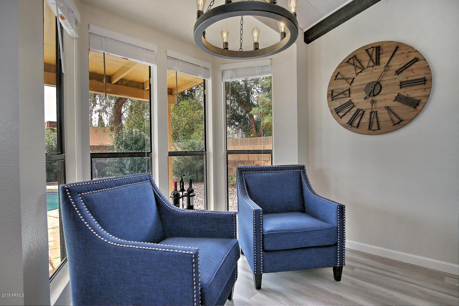 6521 East Grandview Drive Scottsdale, AZ 85254 - Photo 10 of 27 a living room with furniture and a window