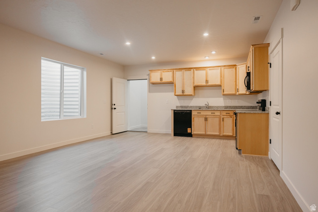 4595 North Fallow Way, Unit 511 Eagle Mountain, UT 84005 - Photo 5 of 32 Kitchen with light wood finish cabinets, black appliances, light wood finished floors, and recessed lighting