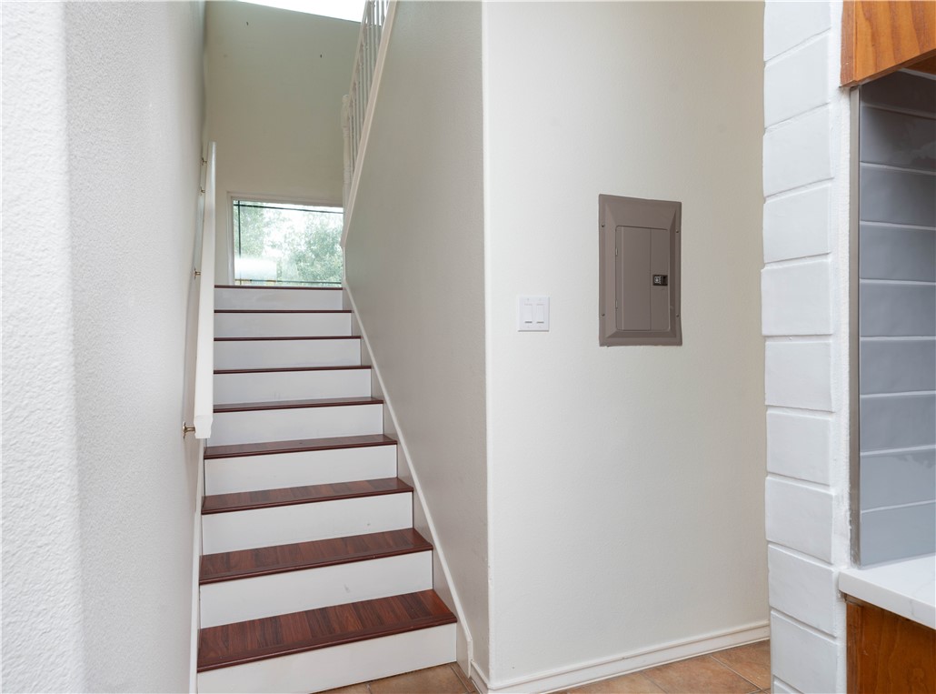 1034 Graham Road Corpus Christi, TX 78418 - Photo 28 of 40 a view of a hallway with wooden floor and entryway