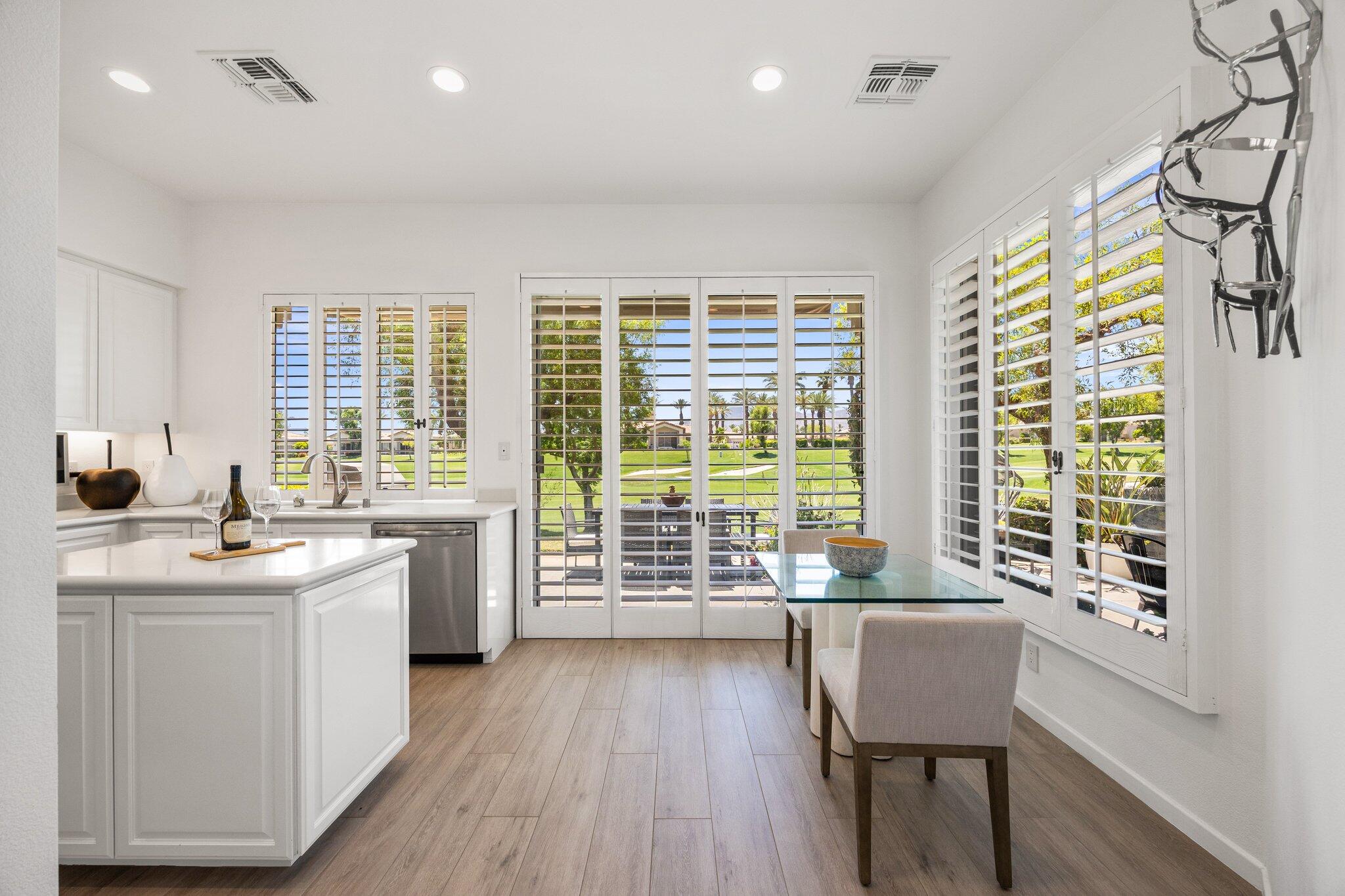 763 Box Canyon Trail Palm Desert, CA 92211 - Photo 20 of 48 a kitchen with sink and wooden cabinets