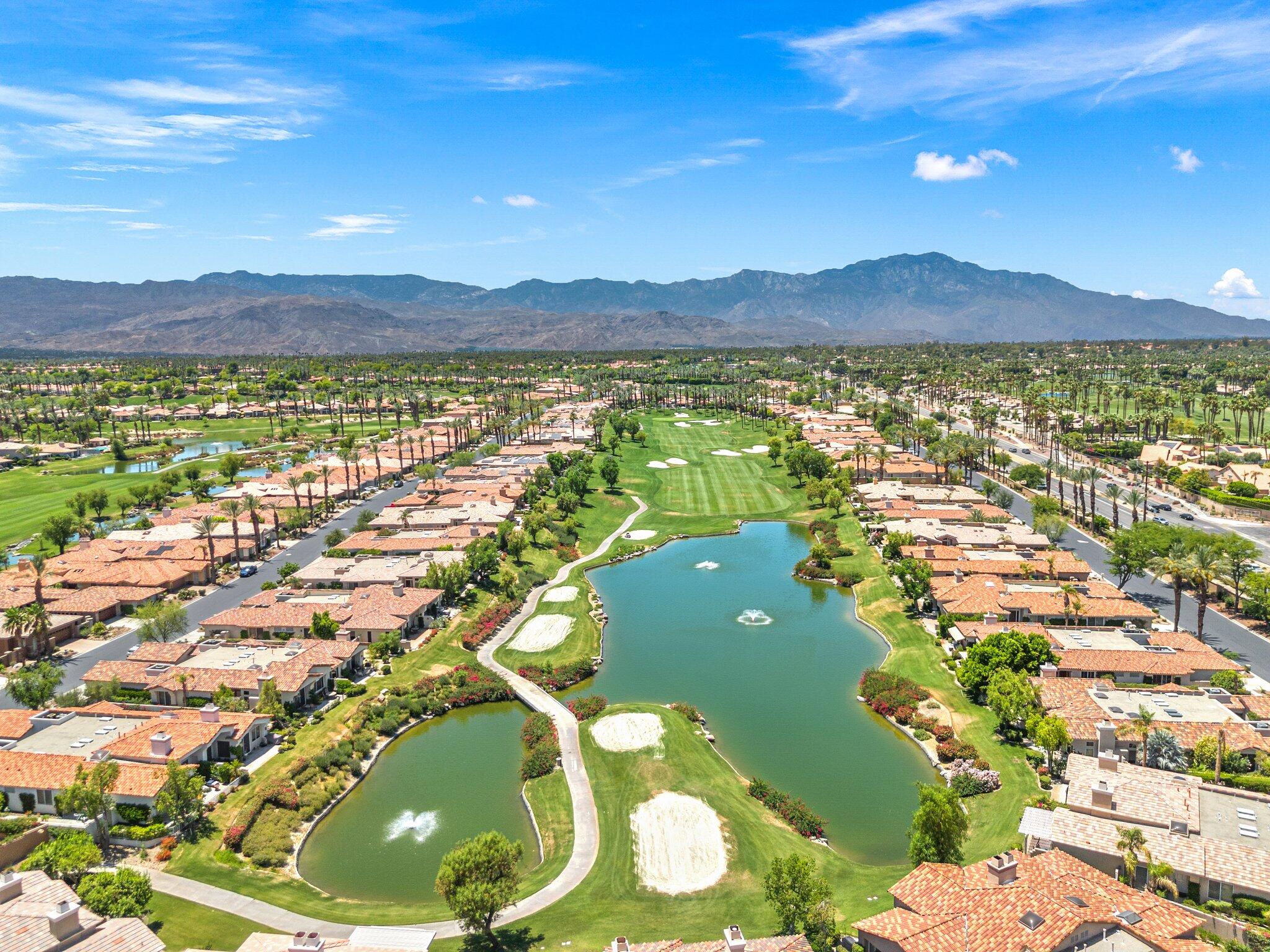 763 Box Canyon Trail Palm Desert, CA 92211 - Photo 3 of 48 a view of a lake with a mountain
