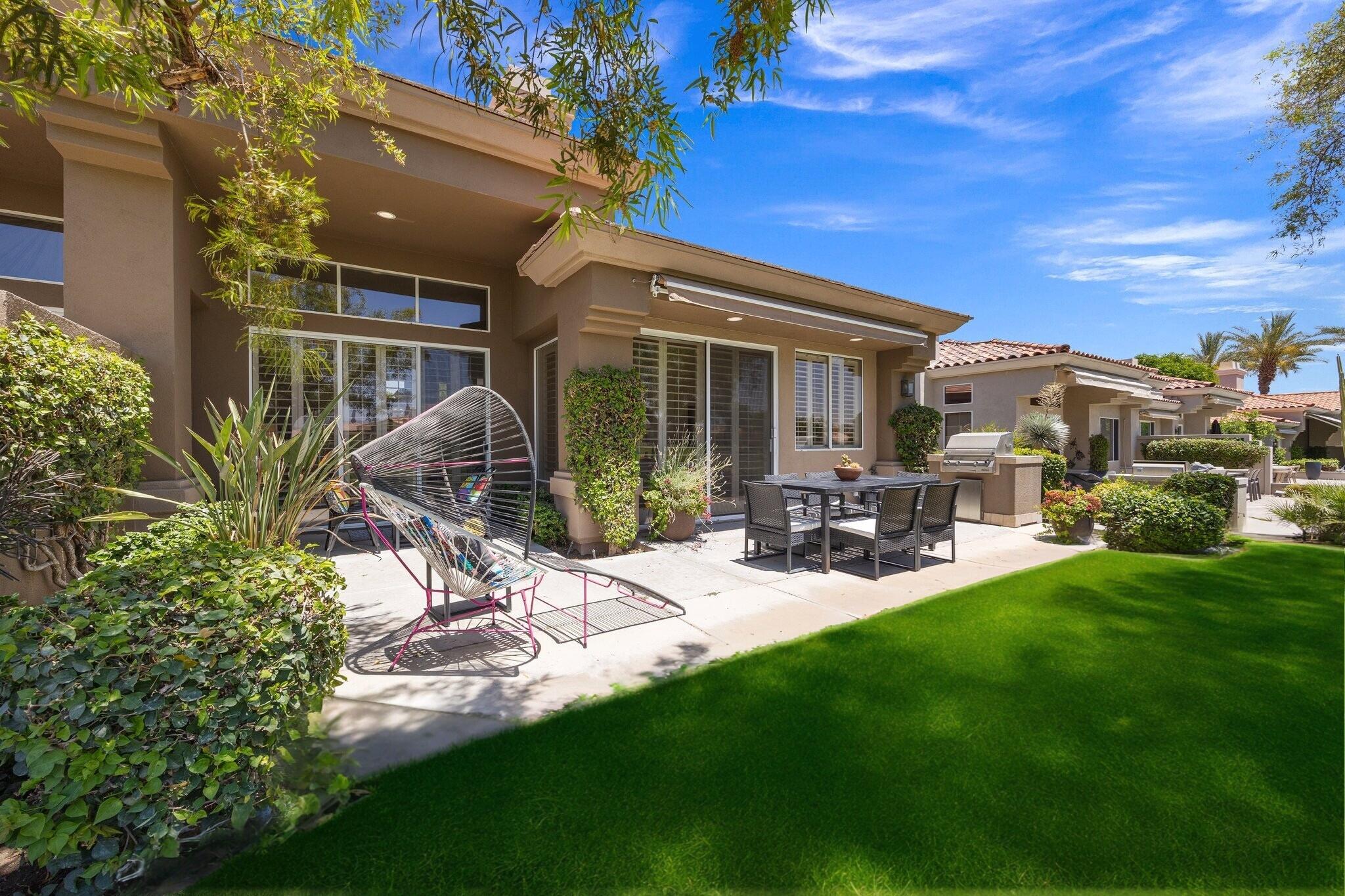 763 Box Canyon Trail Palm Desert, CA 92211 - Photo 35 of 48 a view of a house with backyard porch and sitting area