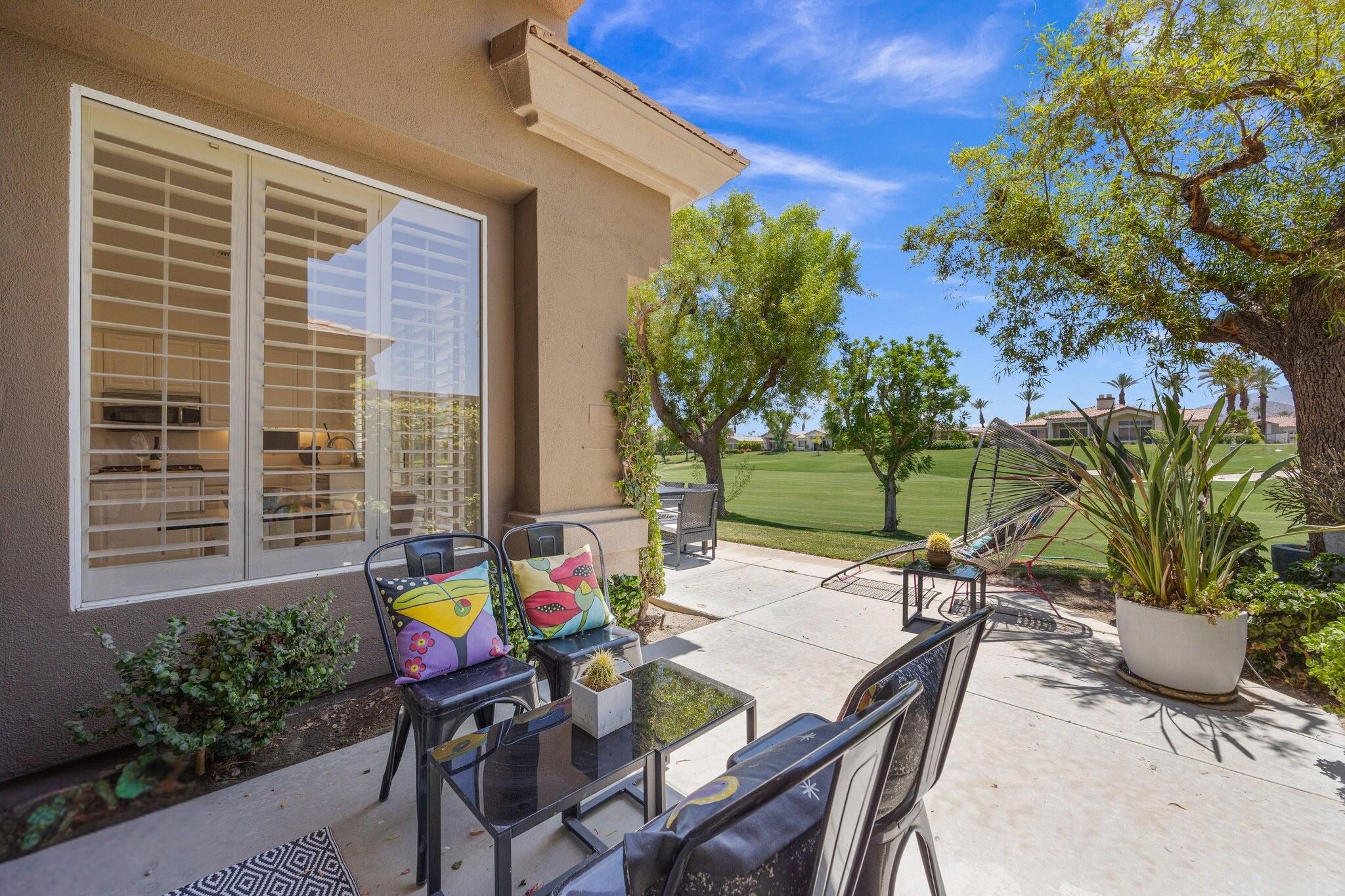 763 Box Canyon Trail Palm Desert, CA 92211 - Photo 40 of 48 a view of an outdoor space with a patio