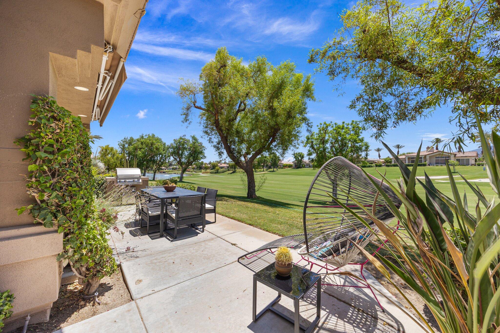 763 Box Canyon Trail Palm Desert, CA 92211 - Photo 43 of 48 a view of a backyard with sitting area