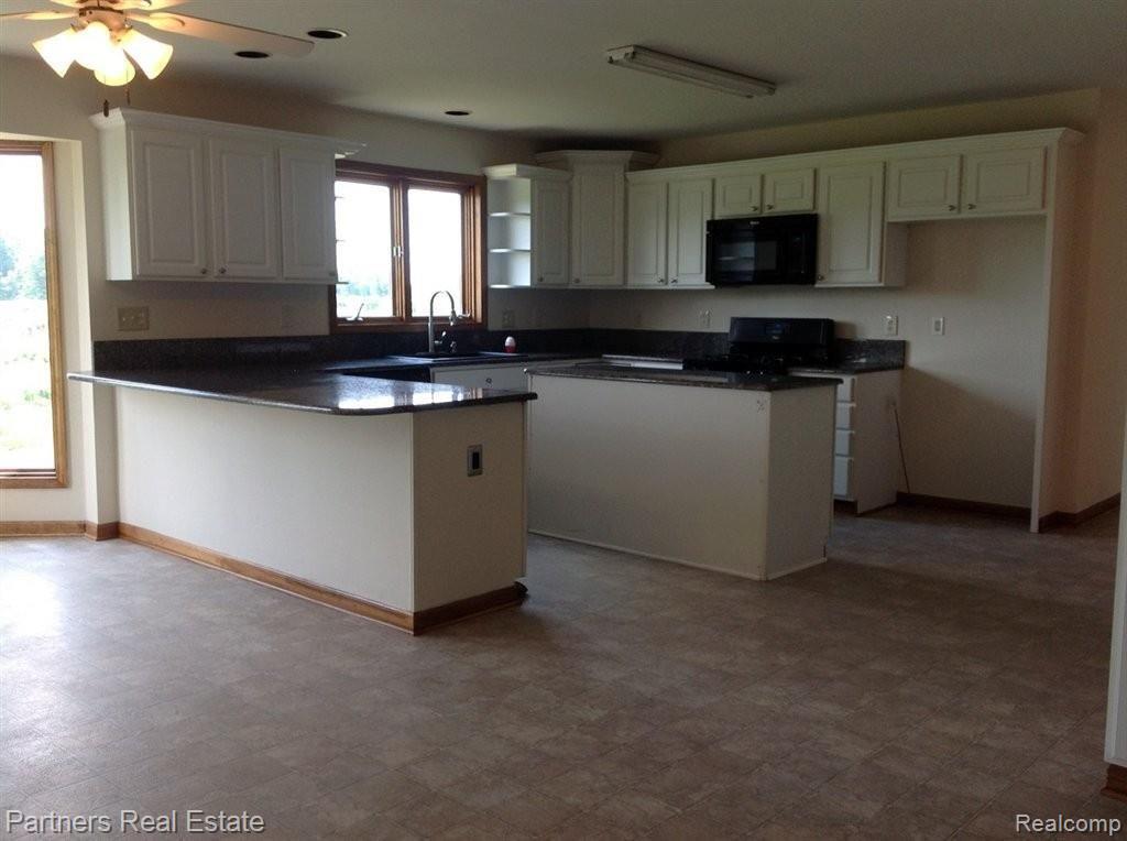 6817 West Lange Road Fowlerville, MI 48836 - Photo 2 of 21 Large Open Kitchen