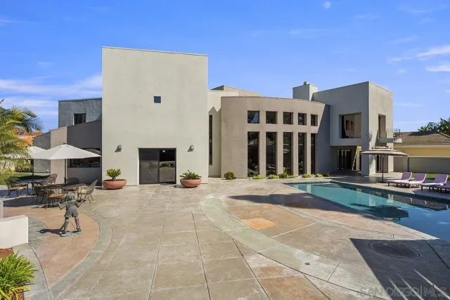 a view of a building with sitting area