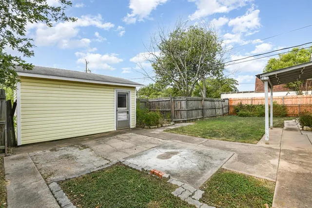 a view of a backyard with a garden