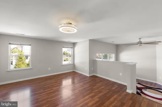 a large bathroom with a double vanity sink and a mirror