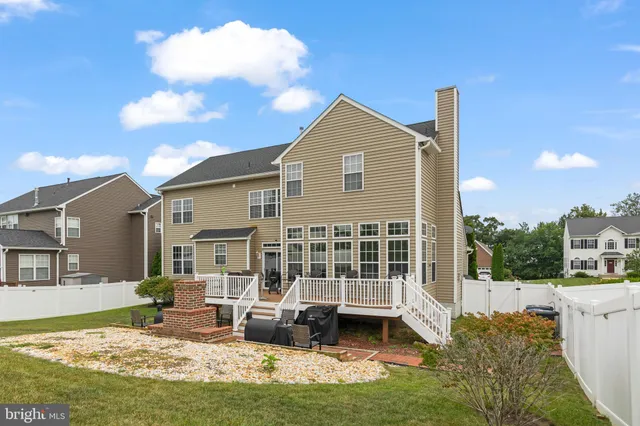 a view of roof deck with patio
