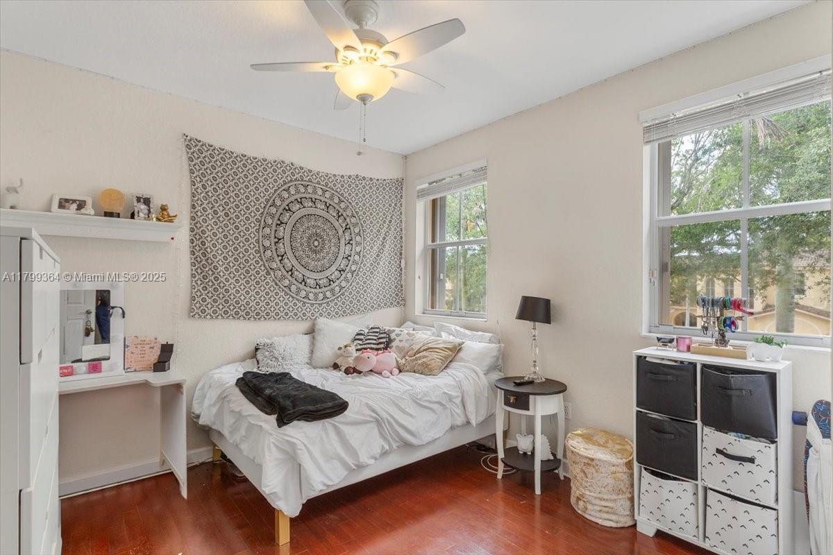12367 Southwest 122nd Street Miami, FL 33186 - Photo 31 of 35 a bedroom with a bed and a window