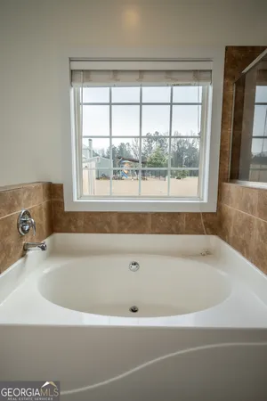 a view of balcony with wooden floor