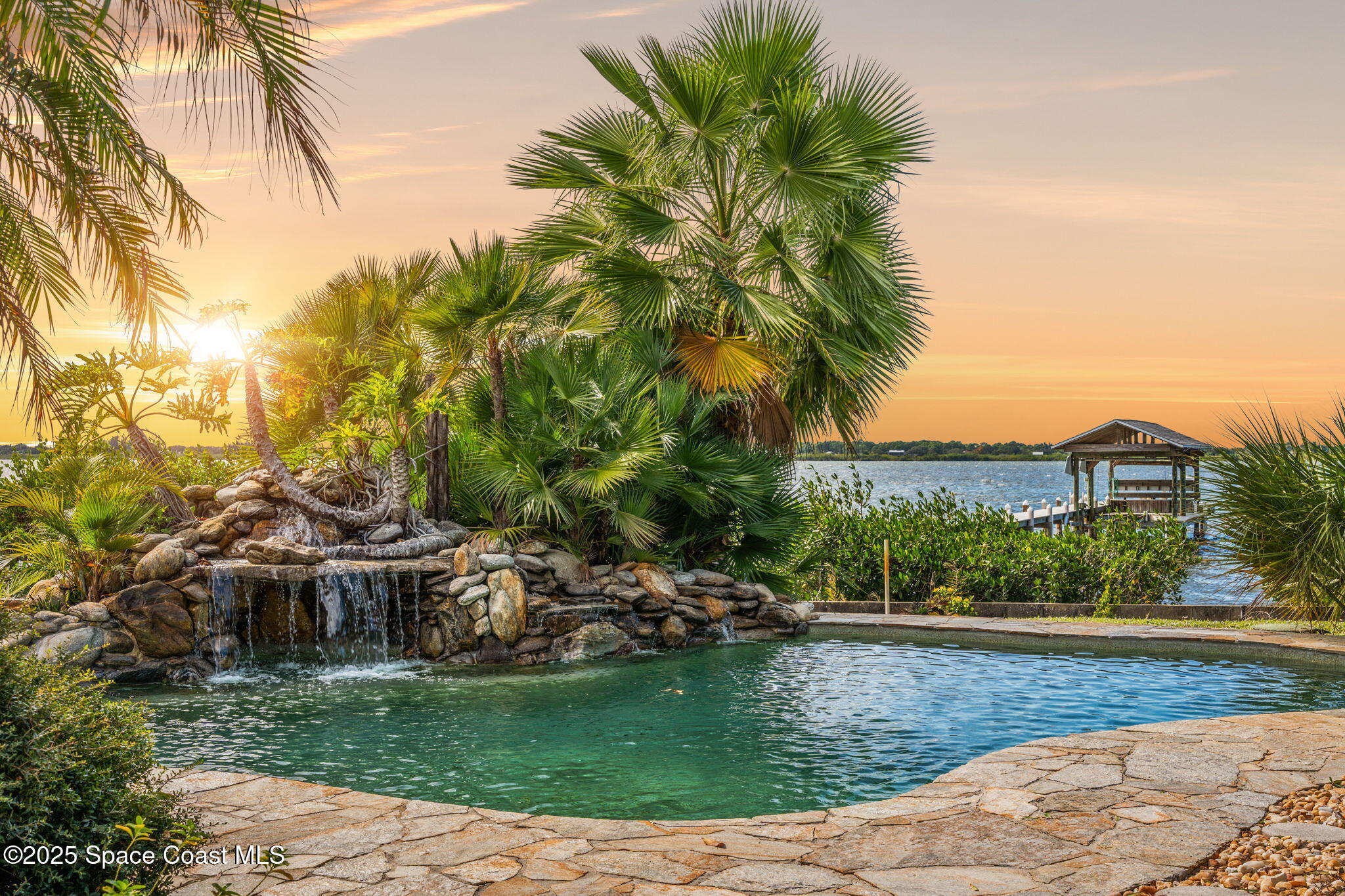 1940 Gates Road Merritt Island, FL 32952 - Photo 2 of 72 a view of a house with a yard