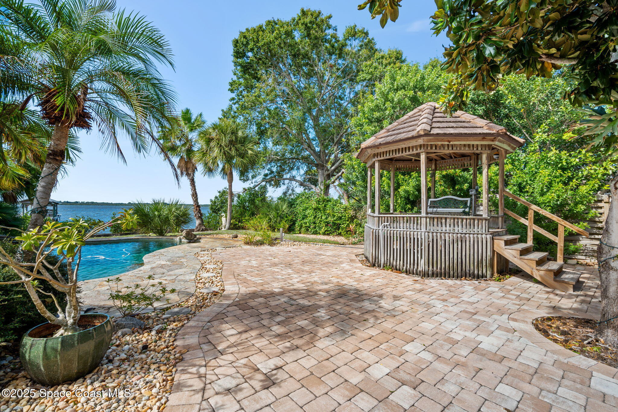 1940 Gates Road Merritt Island, FL 32952 - Photo 31 of 72 a view of a chair and table in the patio