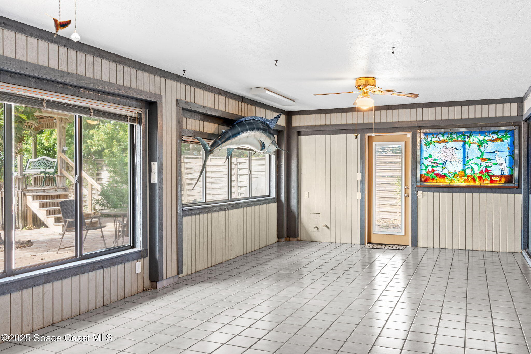 1940 Gates Road Merritt Island, FL 32952 - Photo 43 of 72 a view of an entryway with a garden