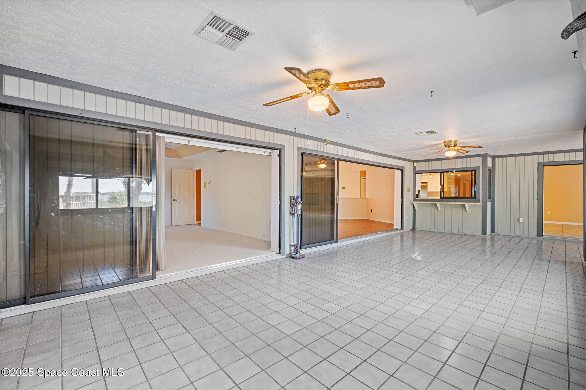 1940 Gates Road Merritt Island, FL 32952 - Photo 45 of 72 a view of an empty room with a window