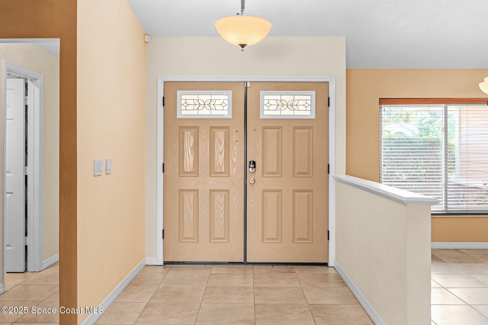 1940 Gates Road Merritt Island, FL 32952 - Photo 59 of 72 a view of a hallway with a window