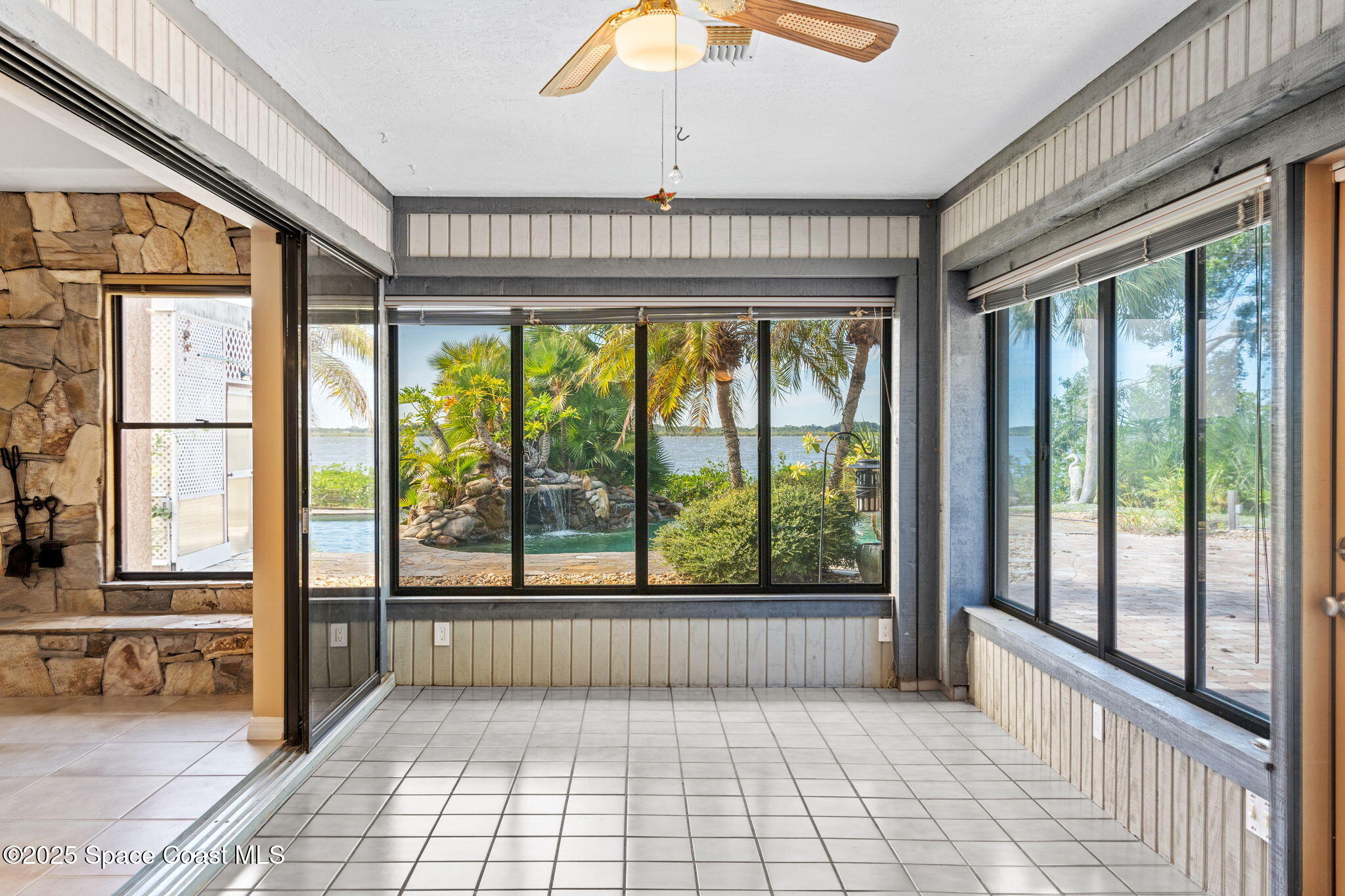 1940 Gates Road Merritt Island, FL 32952 - Photo 66 of 72 a view of an entryway with a floor to ceiling window