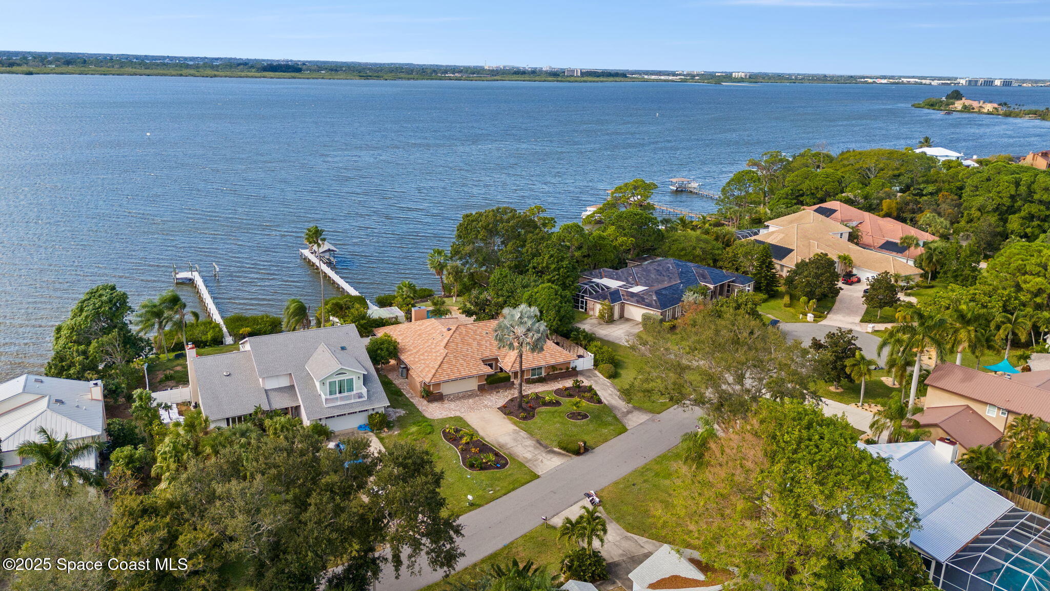 1940 Gates Road Merritt Island, FL 32952 - Photo 69 of 72 an aerial view of a house with a lake view