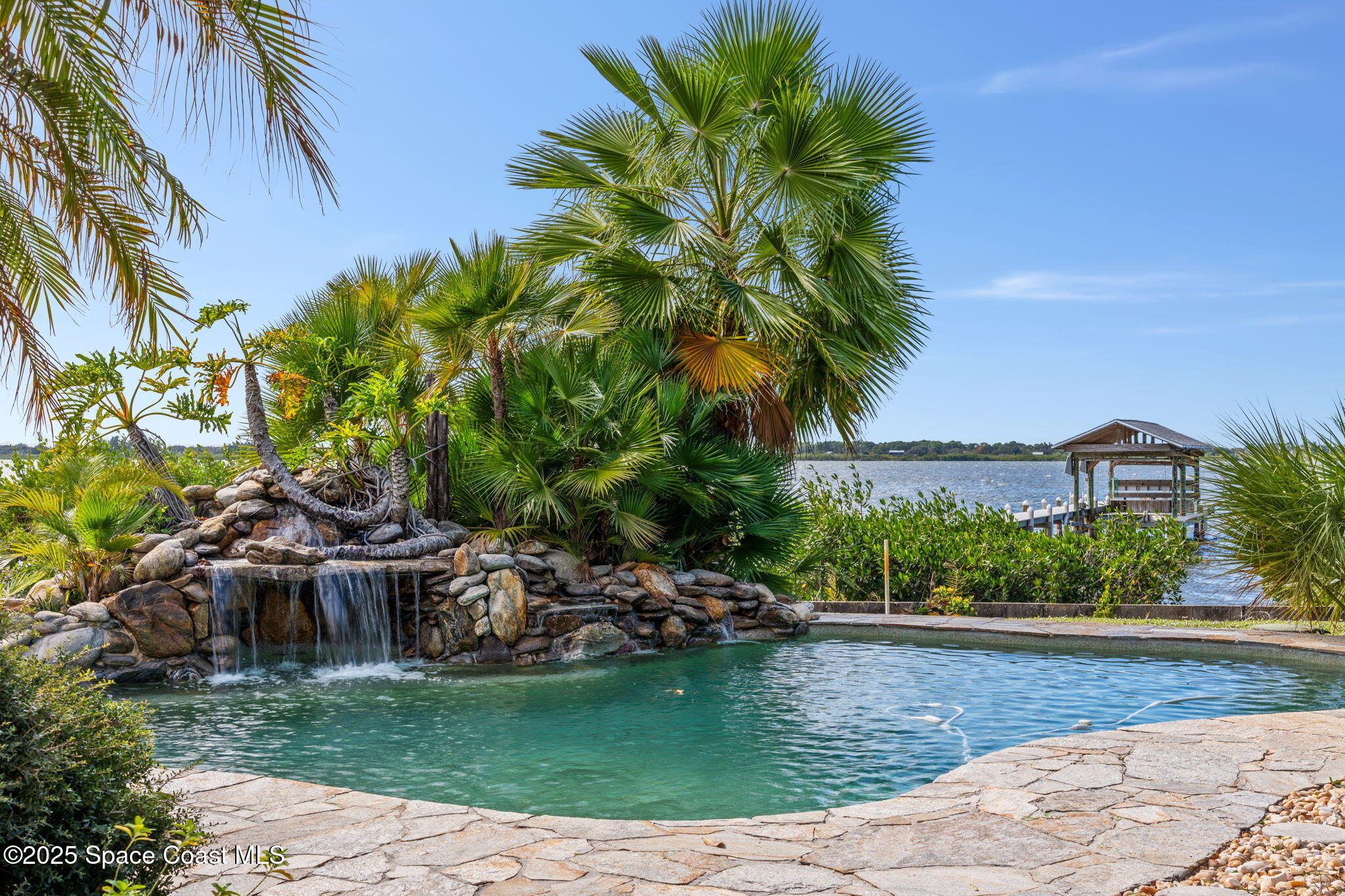 1940 Gates Road Merritt Island, FL 32952 - Photo 9 of 72 a view of a house with a yard