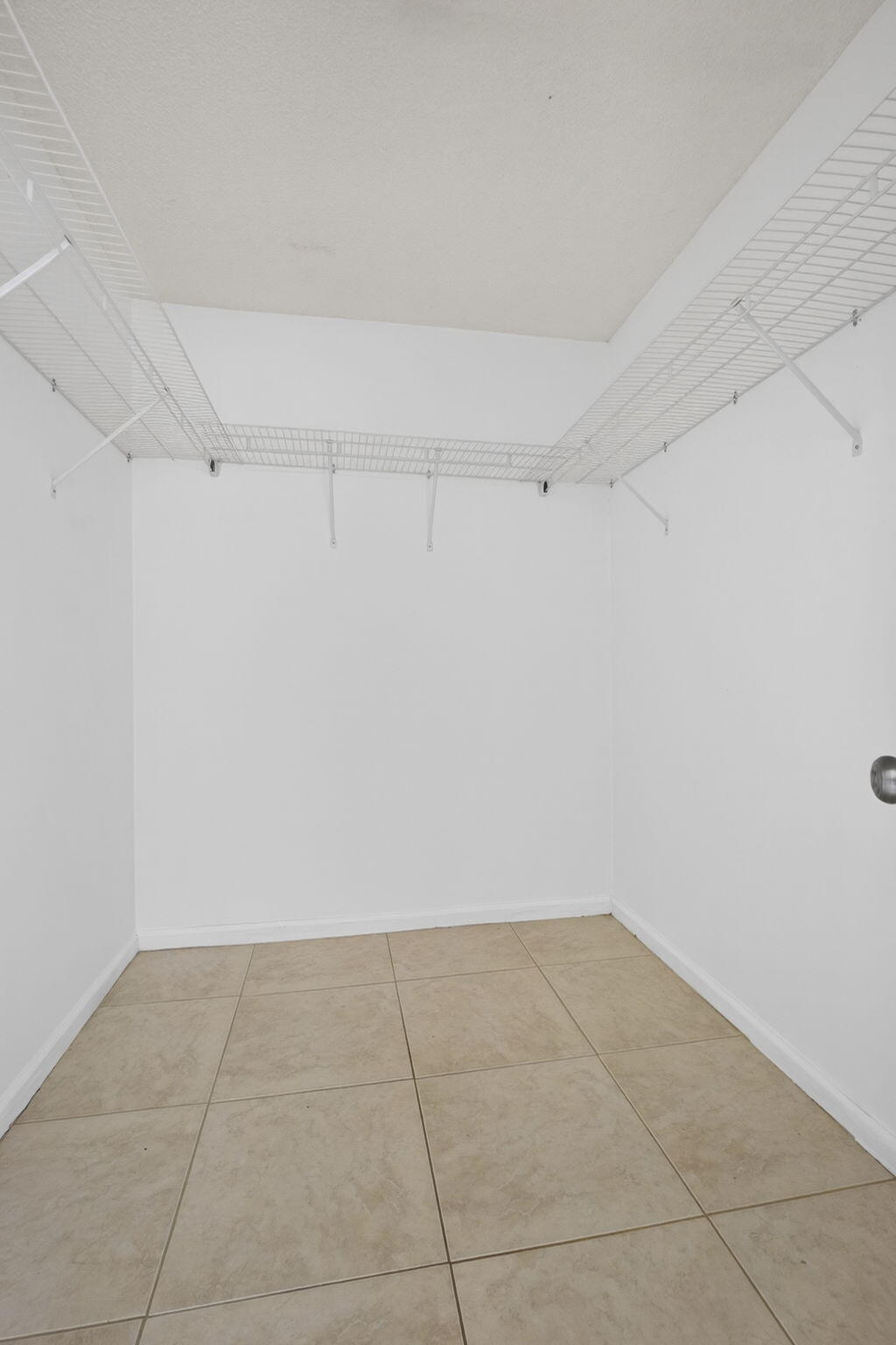 7107 181st Street Jupiter, FL 33458 - Photo 21 of 54 a view of a room with shelf