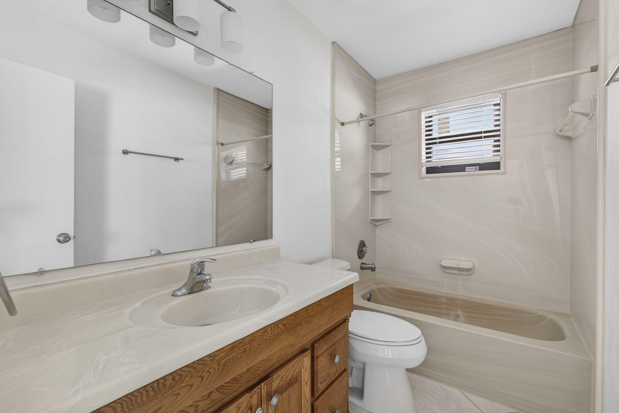 7107 181st Street Jupiter, FL 33458 - Photo 26 of 54 a bathroom with a sink a toilet and shower