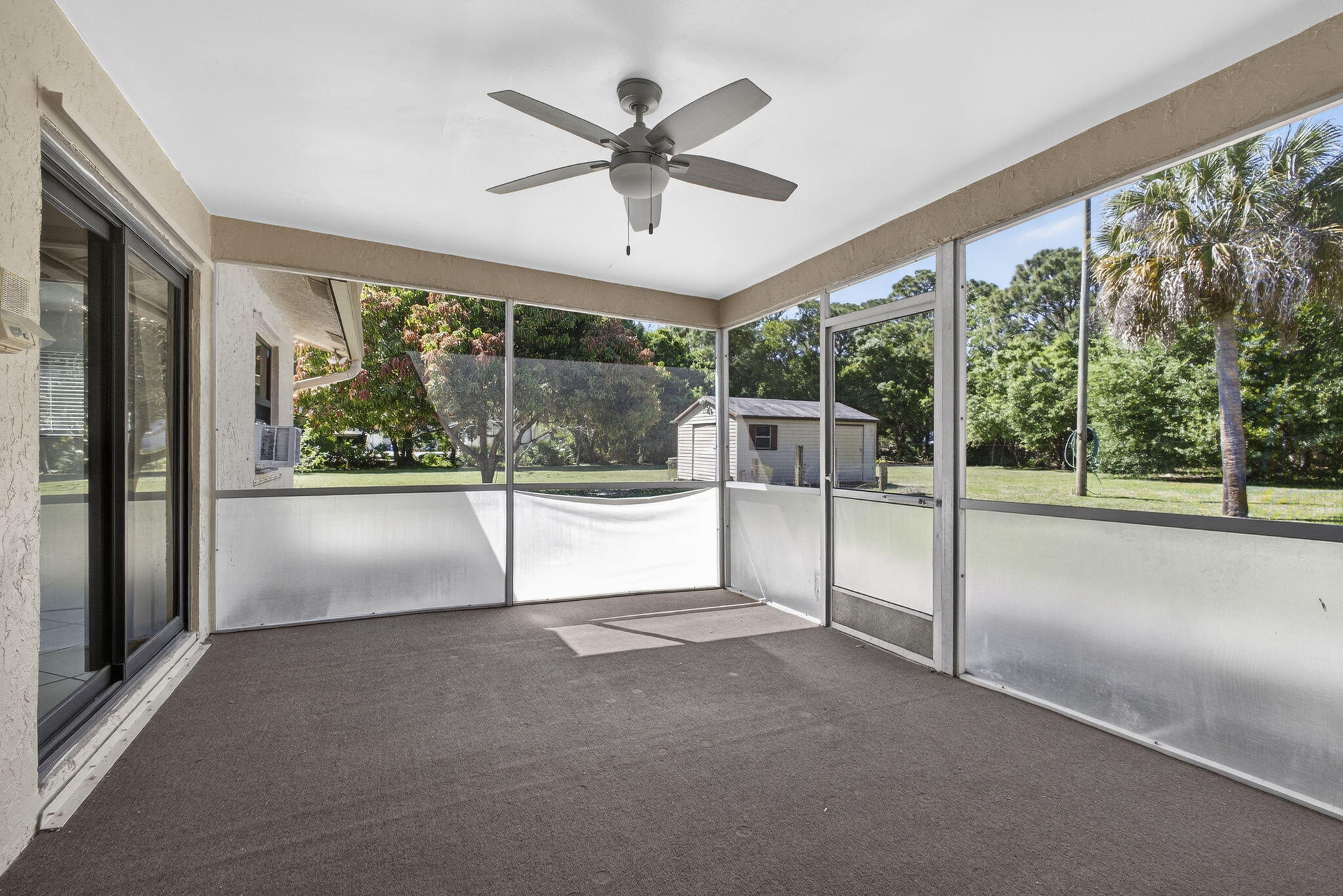 7107 181st Street Jupiter, FL 33458 - Photo 33 of 54 a view of an empty room with a balcony