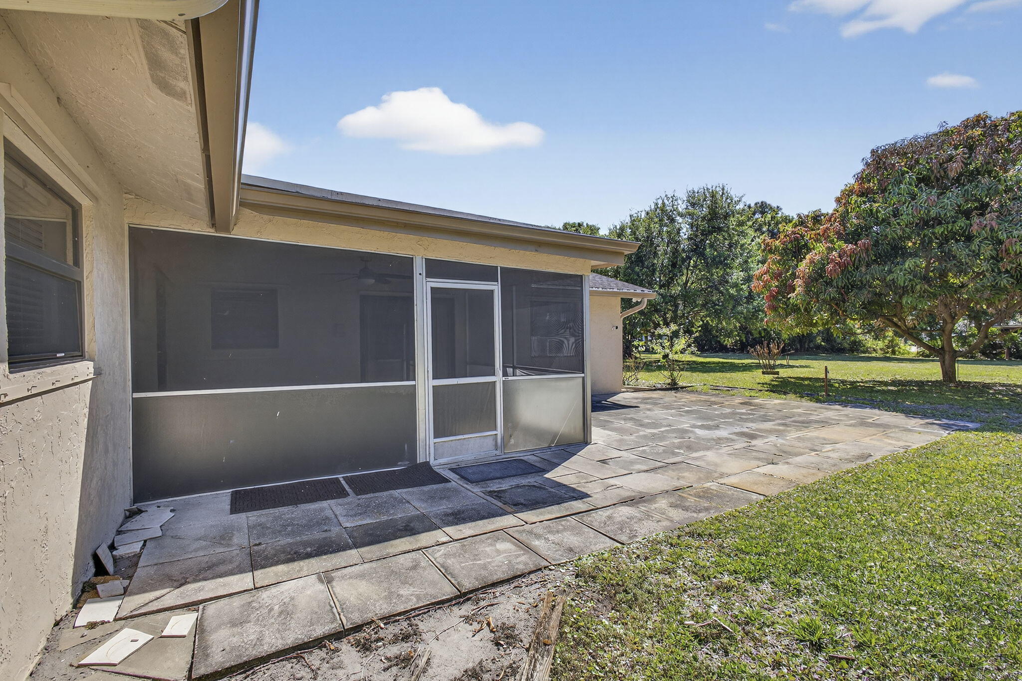 7107 181st Street Jupiter, FL 33458 - Photo 37 of 54 a view of a house with a yard