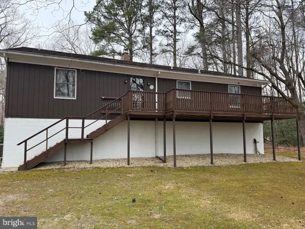 a house view with a backyard space