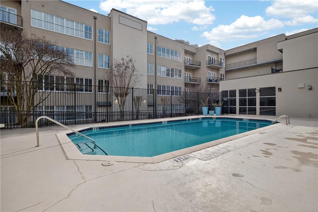 384 Ralph McGill Boulevard Northeast, Unit 322 Atlanta, GA 30312 - Photo 23 of 23 a view of pool with a yard