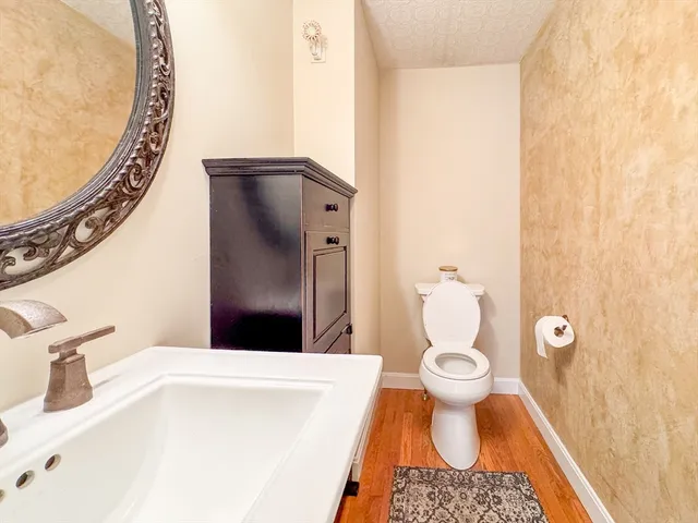 a bathroom with a toilet and a sink